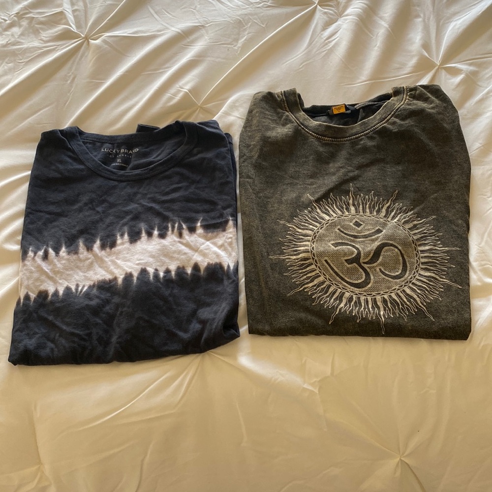 Two t shirts size XL one lucky brand the other one from east meets west